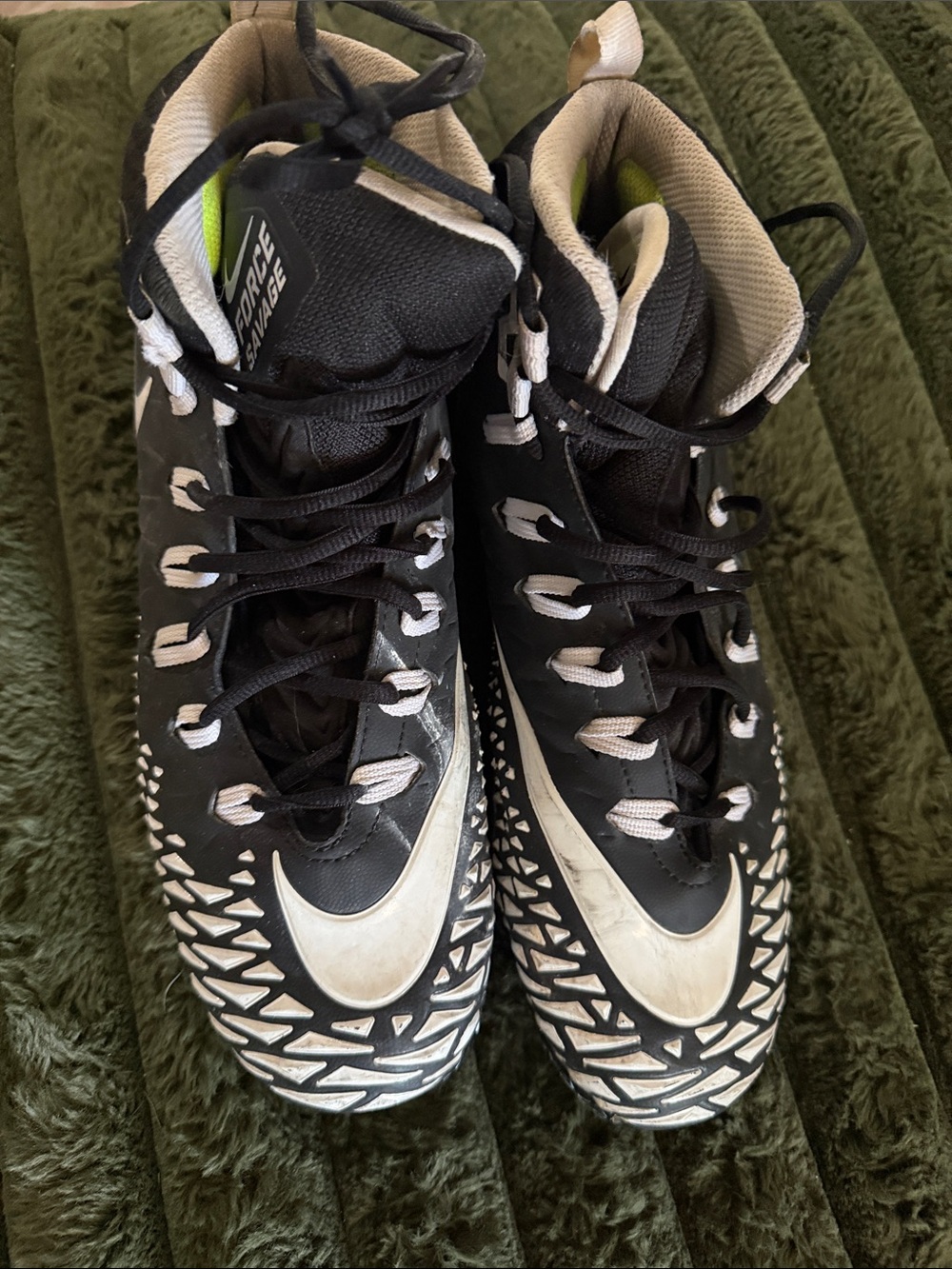 Nike mens Black and White Athletic Cleats with Textured Toe